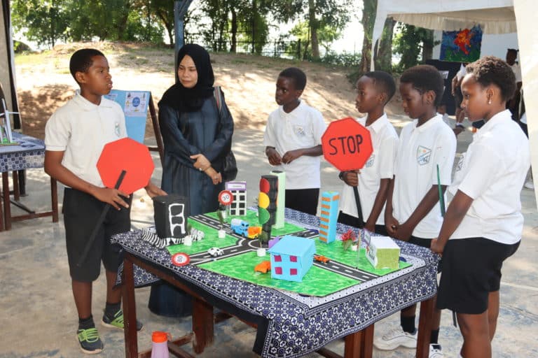 Close up portrait of a happy business woman smiling outside office building